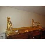 Set of four carved and gilded wall shelves with S scroll supports and marble tops