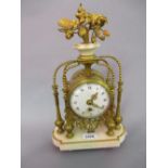 19th Century French ormolu mantel timepiece, the enamel dial with Arabic and Roman numerals,
