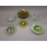 Set of six Venetian amber glass plates, another similar plate,