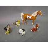 Group of three Beswick figures of a pony,