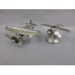 American Demley chromium plated table lighter in the form of an aircraft together with a cast alloy