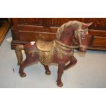 Small carved and painted wooden horse