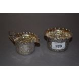 London silver floral embossed cream jug with matching sugar bowl, makers mark G.M.J.