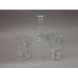 Modern etched glass decanter decorated with a sailing boat together with a set of four similar