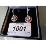 Pair of 18ct white gold ruby and diamond drop earrings,