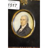 Two early 19th Century miniature watercolour portraits of a gentleman on ivory together with a