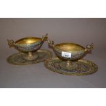 Pair of gilt brass and enamel decorated two handled pedestal bowls with matching stands