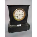 Small black slate two train mantel clock with pendulum