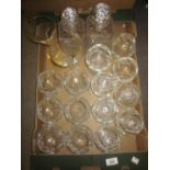 Two boxes containing a quantity of various 20th Century cut glass including two decanters,