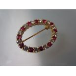 Good quality 18ct yellow gold oval brooch set diamonds and rubies
