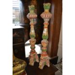 Pair of Continental carved and painted candle stands in 17th Century style