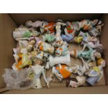 Box containing a collection of thirty two various miniature porcelain half dolls
