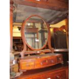 George III mahogany oval swing frame toilet mirror with three drawer box base