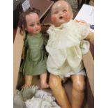 Heubach Koppelsdorf German bisque headed doll with sleeping eyes, open mouth and two teeth,