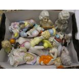Box containing a collection of twenty two various large porcelain half dolls