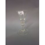 18th Century baluster stem wine glass with a bell bowl raised on hollow knopped stem on a folded