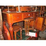 Victorian mahogany dressing table with a moulded top above three drawers,