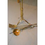 Brass standard lamp with tripod base together with a quantity of brass fire tools