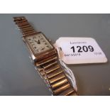 9ct Gold gentleman's wristwatch with silver strap