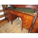 Edwardian mahogany line inlaid one piece pedestal desk having green leather inset top above an