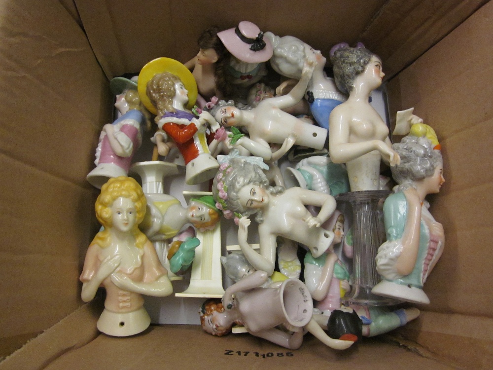 Box containing a collection of twenty five various miniature porcelain half dolls