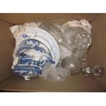 Three various glass decanters, blue and white Willow pattern tureen cover and stand (at fault),
