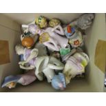 Box containing a collection of twenty five various porcelain half dolls