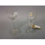 Two 18th Century faceted stem wine glasses,