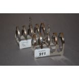 Pair of Sheffield silver four division toast racks,