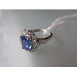 18ct White gold oval sapphire and diamond cluster ring
