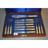 Oak cased set of twelve Victorian silver plated fish knives and forks with carved ivory handles