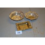 Two small Continental silver trinket dishes of circular pierced design together with a gilt ashtray