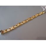 18ct Yellow gold bracelet, the clasp inscribed Leo Jacko CONDITION REPORT 23.