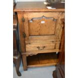 Trevor Lawrence oak side cabinet / aumbry with two fielded panelled doors, two pull-out slides,