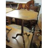 20th Century octagonal walnut crossbanded pedestal table on turned and reeded tapering column and