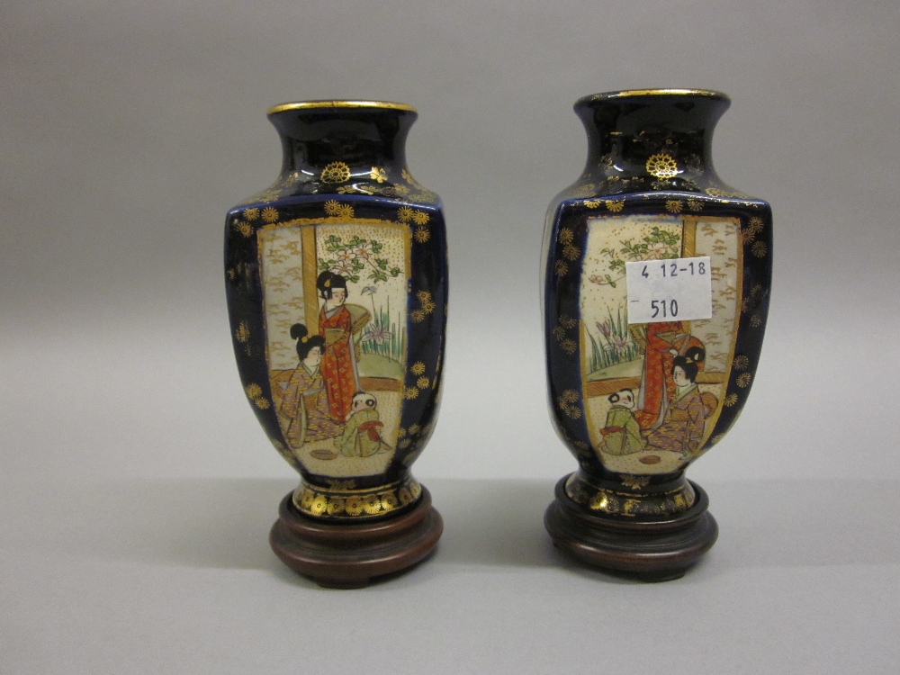 Pair of small Satsuma square pottery vases painted with panels of figures and landscapes