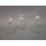 Three 18th Century faceted stem wine glasses,