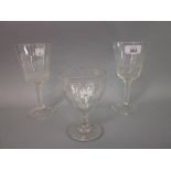 Pair of 19th Century pedestal wine glasses engraved with greyhounds together with an engraved glass
