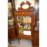 Edwardian mahogany single door display cabinet having galleried top with shell and barbers pole