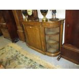 Victorian figured walnut marquetry inlaid and ormolu mounted credenza with a central panelled door