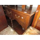 Good quality reproduction oak dresser base with five small drawers above a shaped frieze,