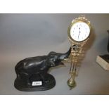 Dark patinated spelter and gilt brass mystery clock in the form of an elephant,