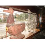 Large painted carved wooden figure of a goose together with a similar wicker work figure