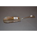 Late George III silver Fiddle pattern straining server with a shaped blade,