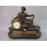 Bronze and coloured marble two train figural mantel clock,