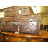 Two early 20th Century leather suitcases