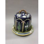 Majolica floral decorated on blue ground cheese dish and cover