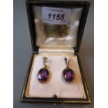 Pair of 18ct gold mounted oval amethyst drop earrings