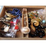Cream jewellery box containing a quantity of various dress jewellery