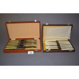 Two cased sets of Art Deco table knives